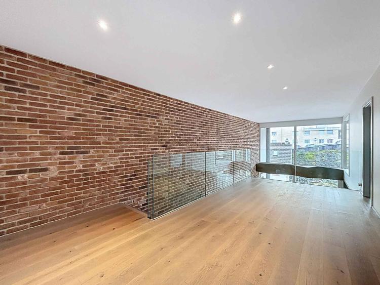 Duplex au style industriel en ville de Neuchâtel