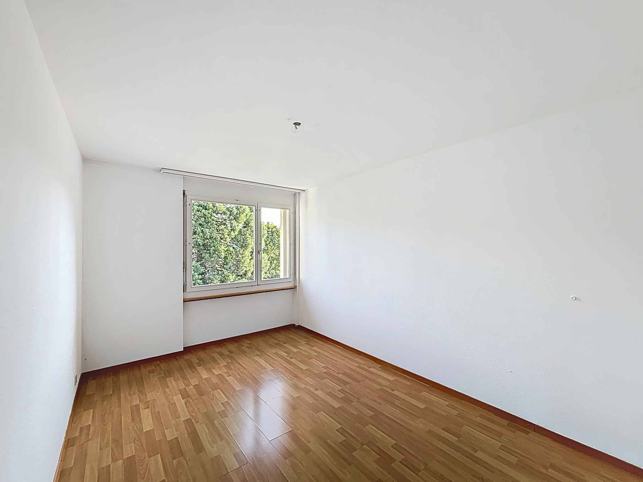 Appartement 4.5 pièces lumineux avec balcon et place de parc