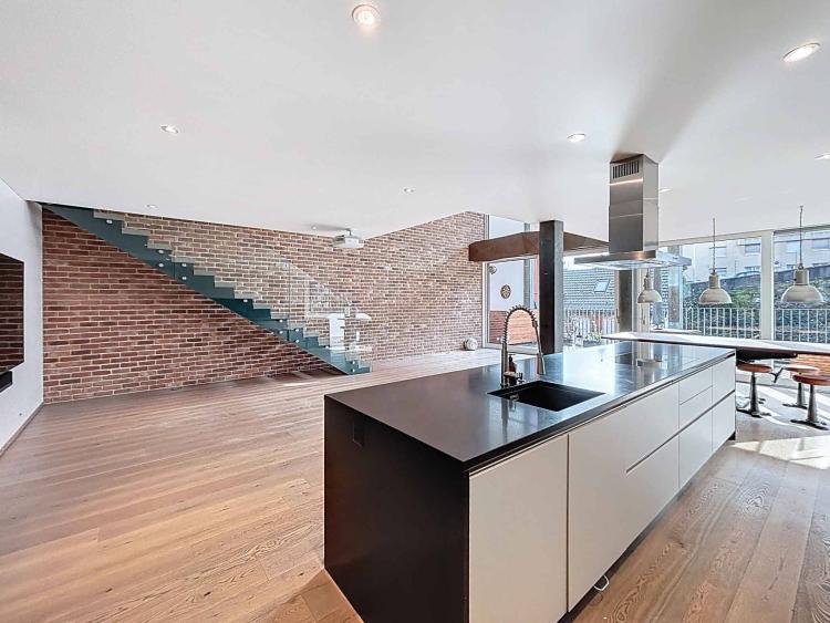 Duplex au style industriel en ville de Neuchâtel