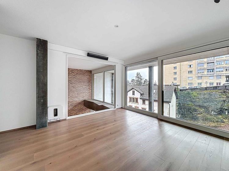 Duplex au style industriel en ville de Neuchâtel