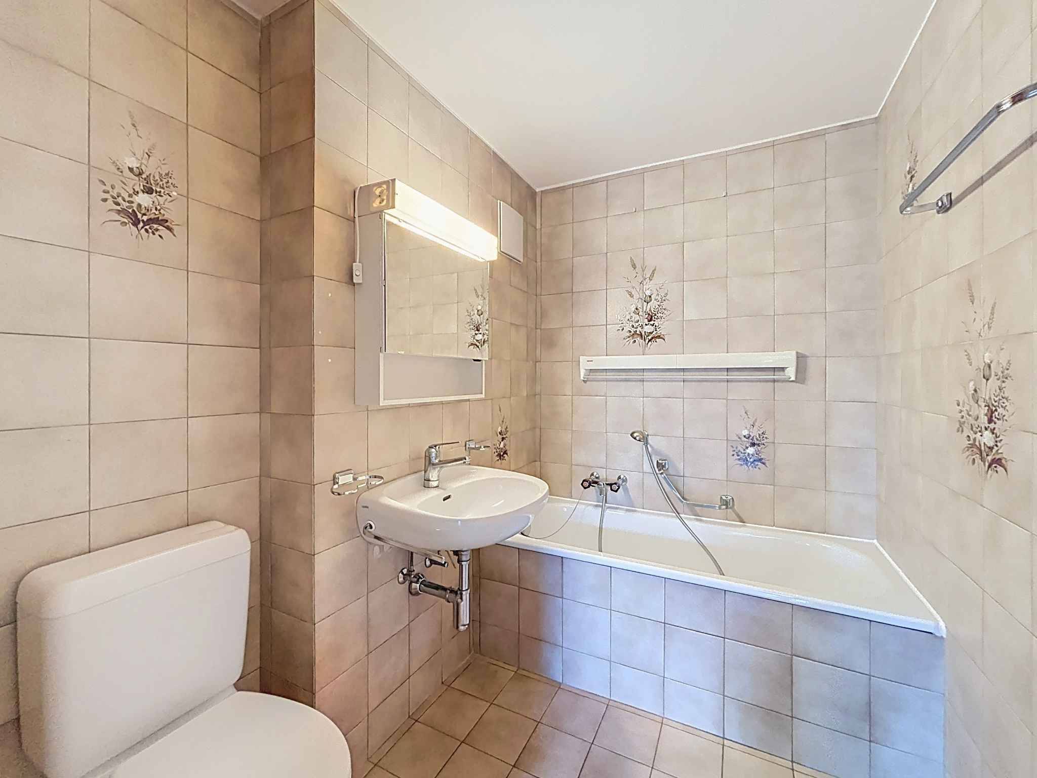 Appartement 4.5 pièces lumineux avec balcon et place de parc